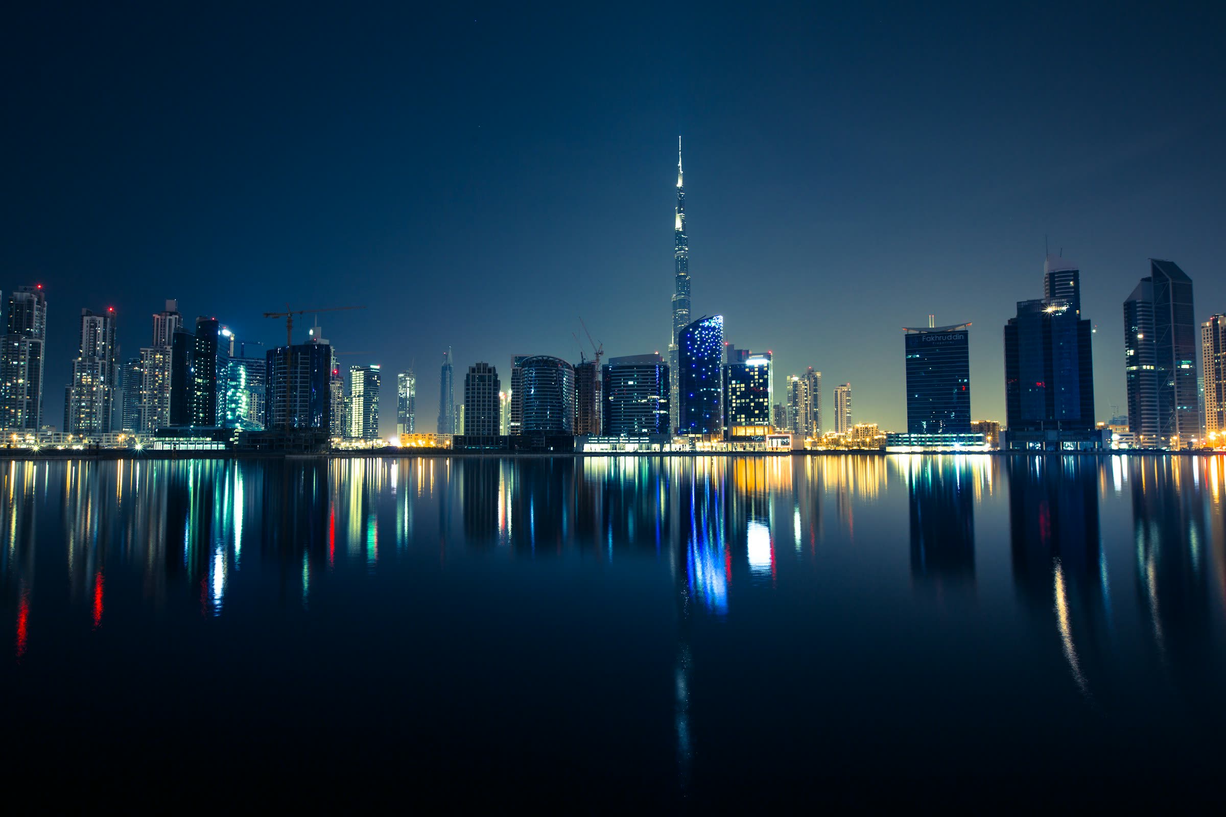 Dubai skyline through a sleek office window